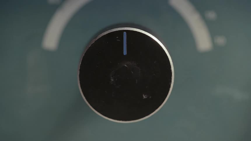 The knob is turned to the halfway point