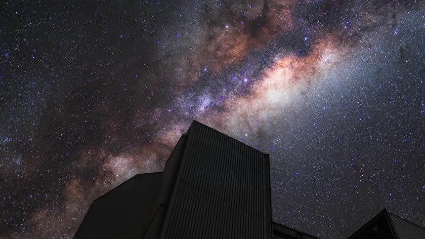 Building rotates and windows open and close underthe starry night sky