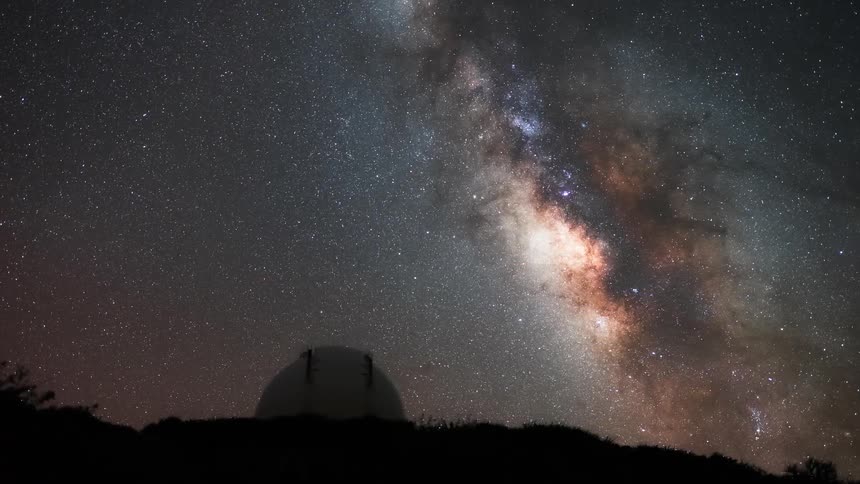 The milky way is in the sky above the telescope