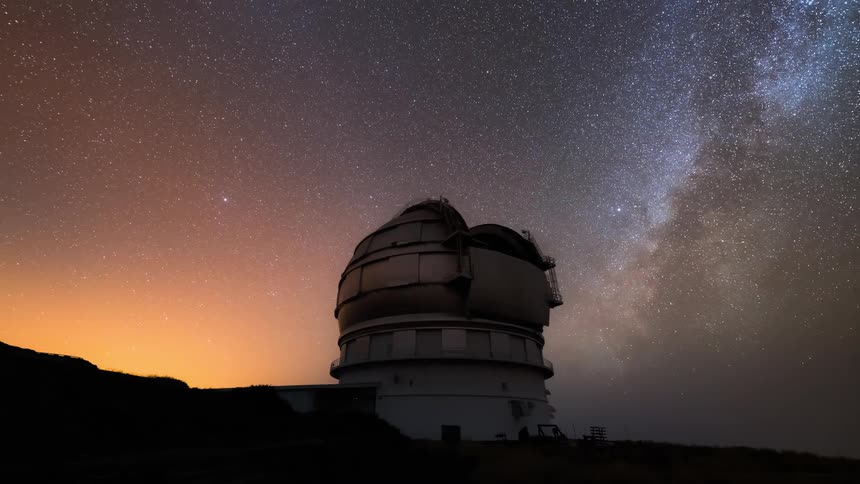 The observatory telescope turns and views the star filled sky