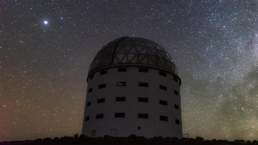 An observatory under a clear starfilled sky