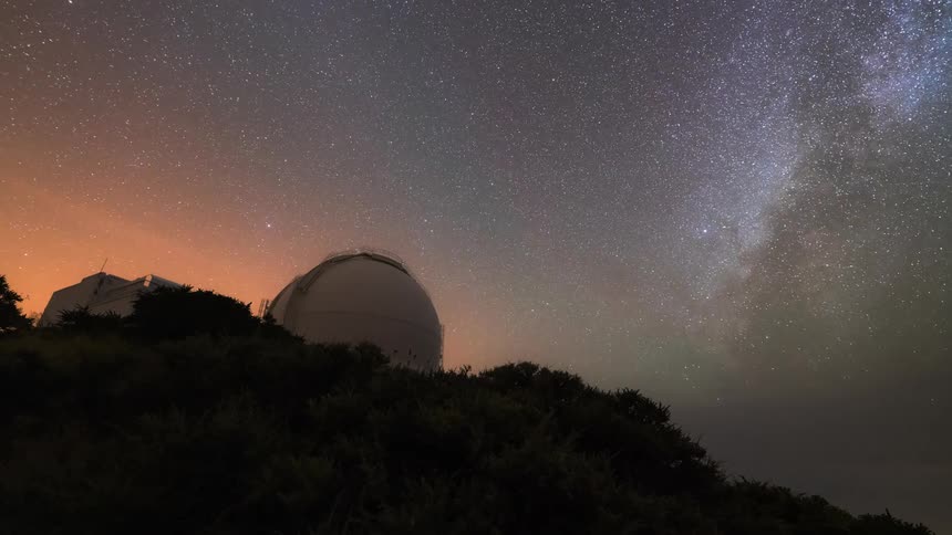 An observatory spins and photographs the night sky