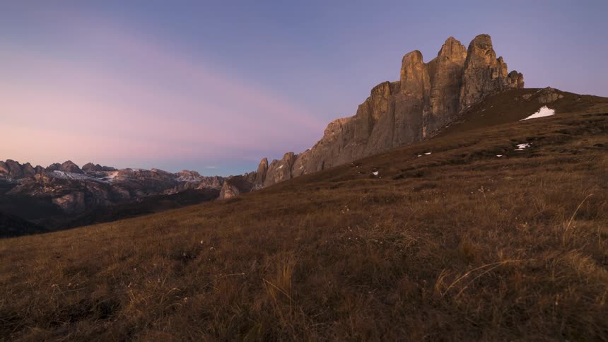 Mountainous scenery with cliffs and the dawning day