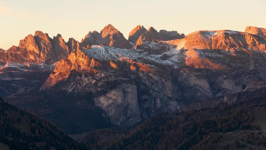 Snowy mountain landscape and darkening day
