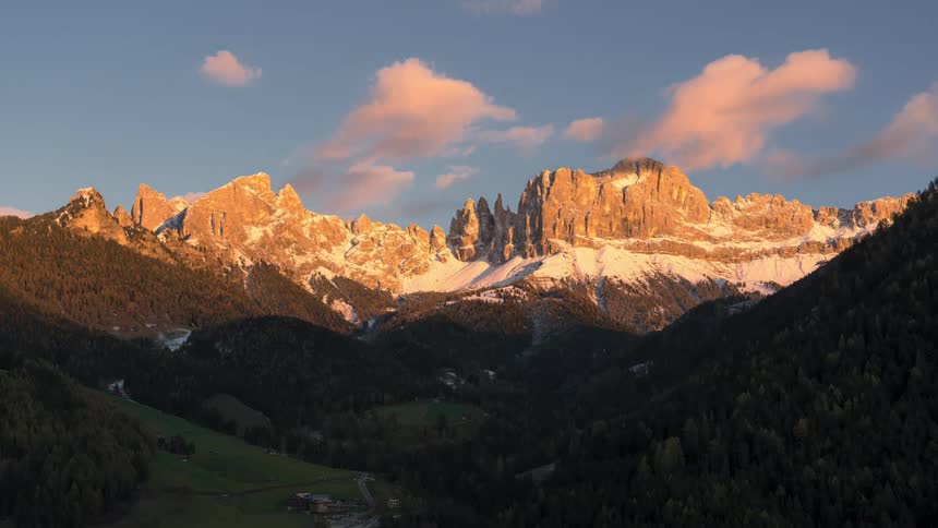 A rural community sits in a mountain valley