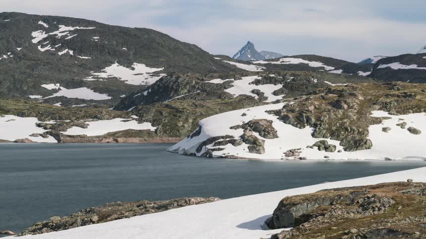 Snow is near the lake