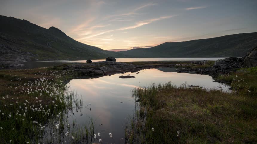 A small pond sits near a coastal area when the tide come in