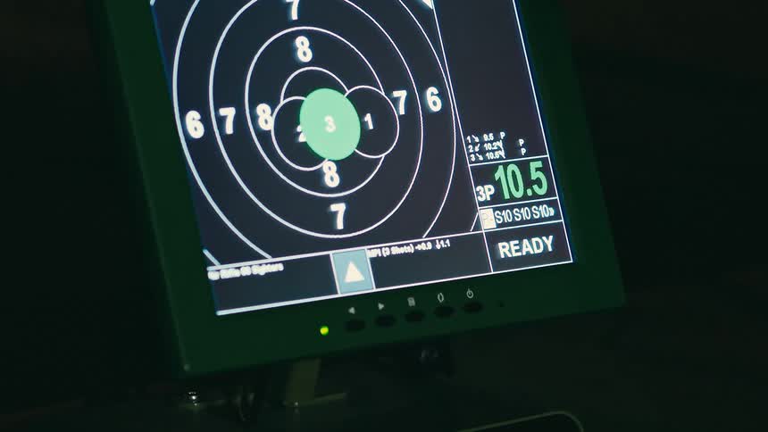 Screen of an electronic device displaying a target with numbered rings