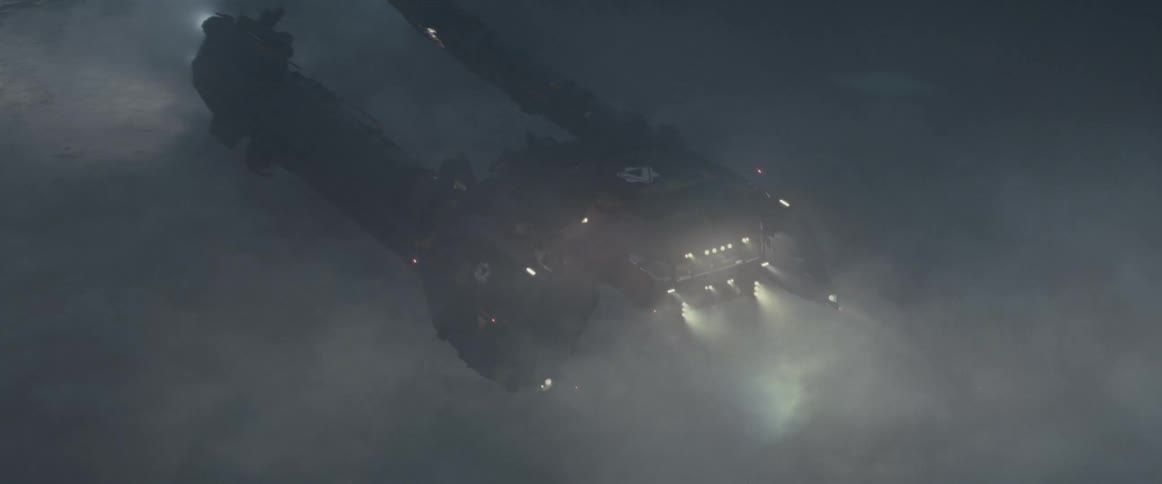 A futuristic space ship prepares to land on a planet