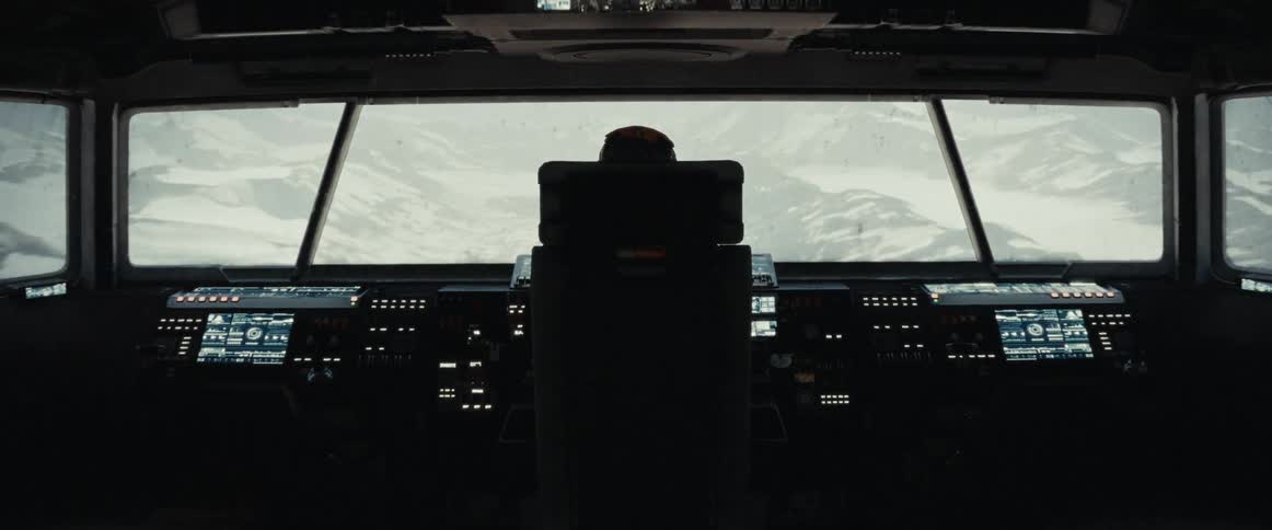 Flying a spaceship over snowcovered mountains