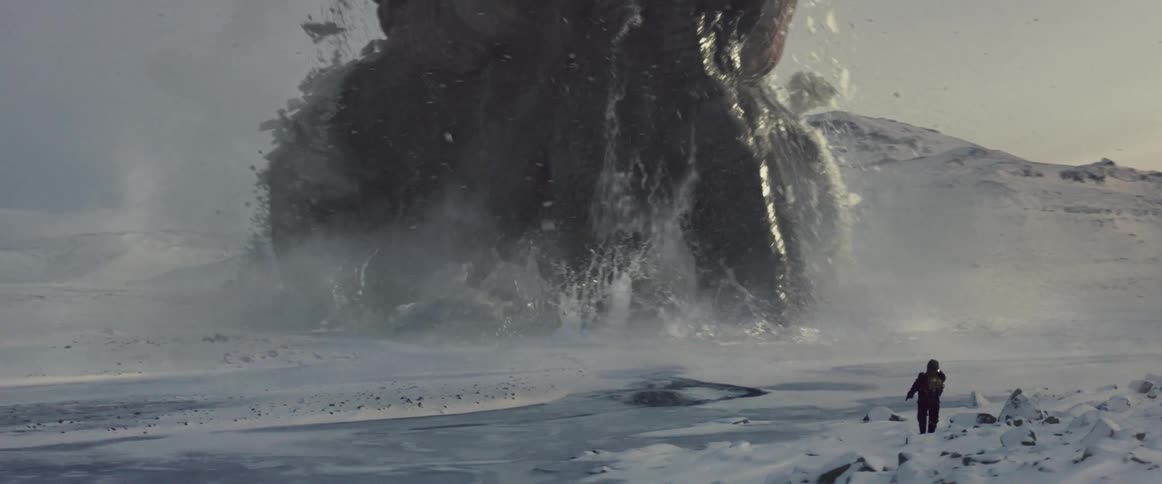 Huge alien with tentacles coming out of the snowy ground facing a person