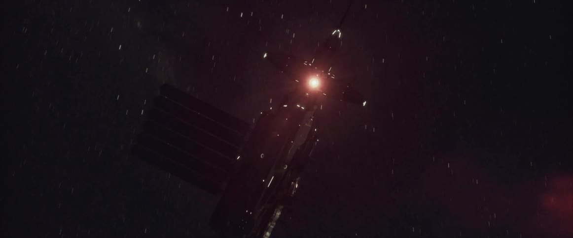 A science fiction spaceship with a strong red light is descending from a dark sky
