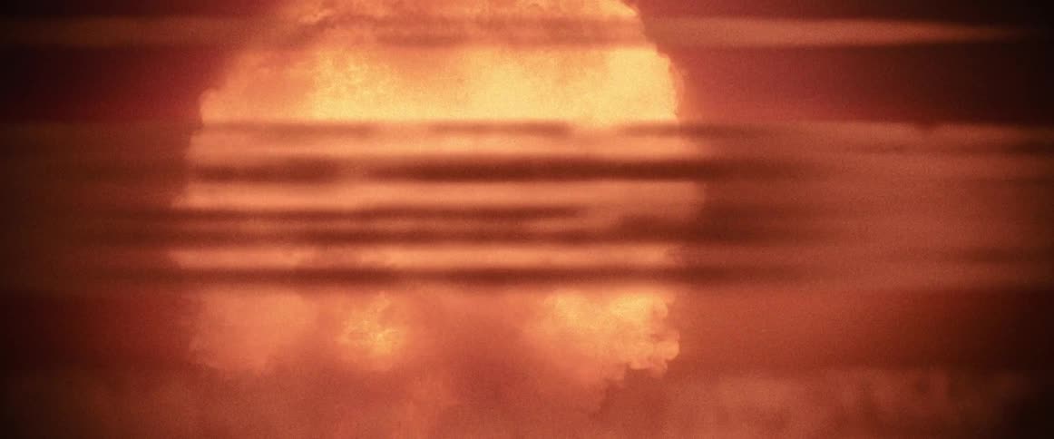 Mushroom cloud expands up into the air from a nuclear explosion