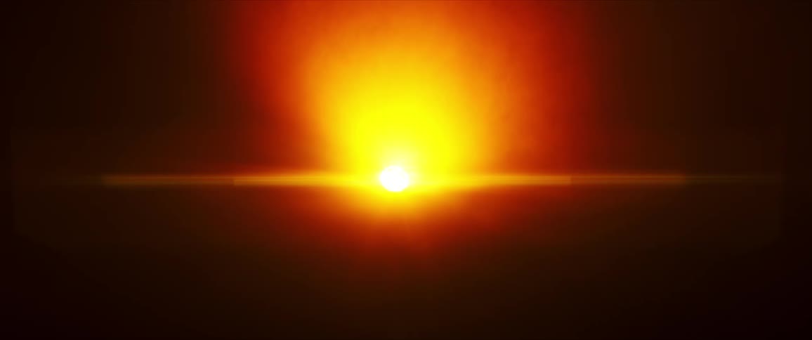A bright yellow light shines in the dark