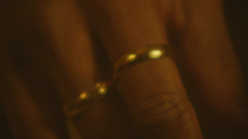 Hand with two golden rings