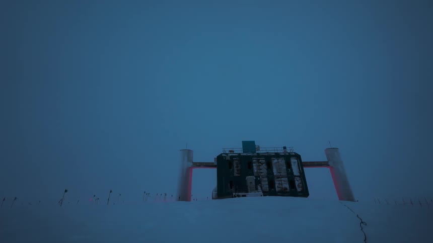 Science station located in a tundra with flags around