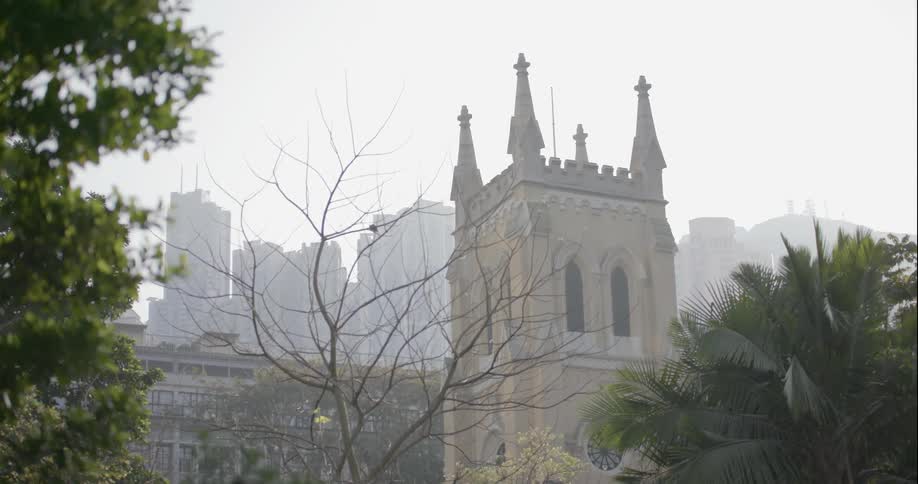 View of a square tower on a hazy day