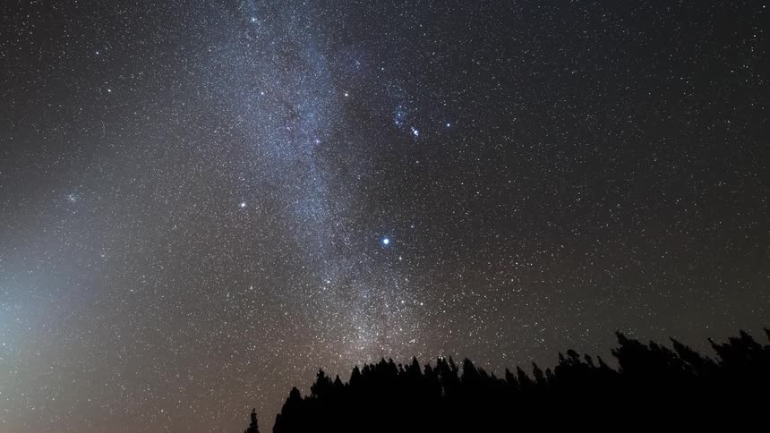 Countless stars are seen in the nighttime sky during a time lapse