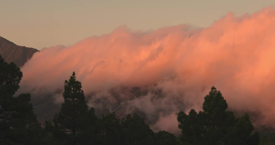 Time lapse of sunrise over a mountain range at sunset