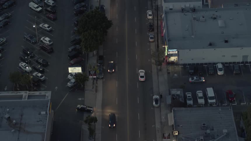 Cars travel on the streets below in this city at night