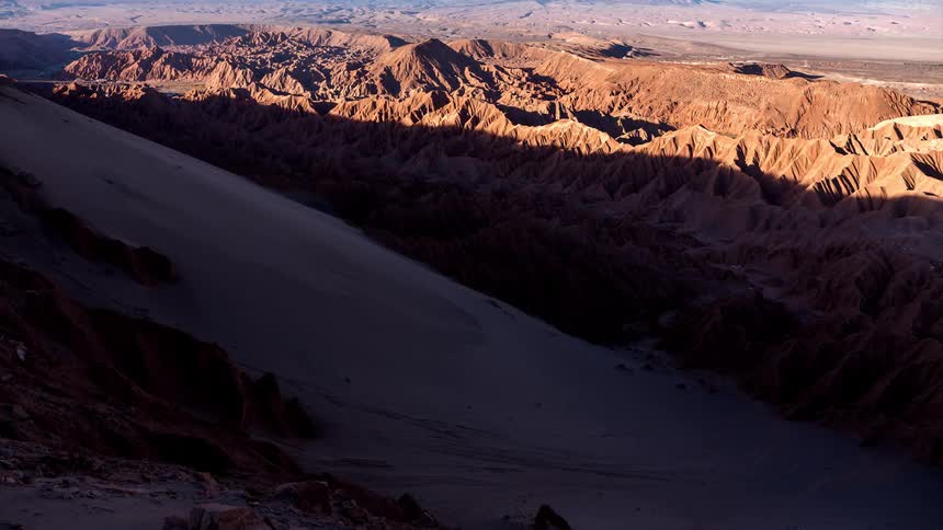 Panorama of shadow covering mountains
