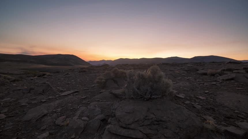 The sun sets on the desert and the stars come out