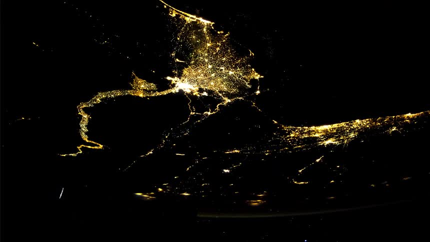 A view of illuminated urban areas seen from space at night