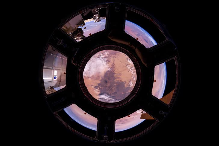 Earth rotates far below the space station