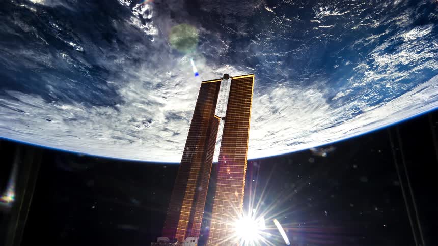 Earth rotates underneath a hovering satellite in outer space