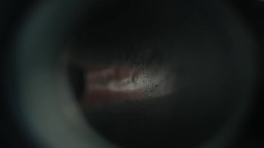 Close up of flames igniting inside a metal tube
