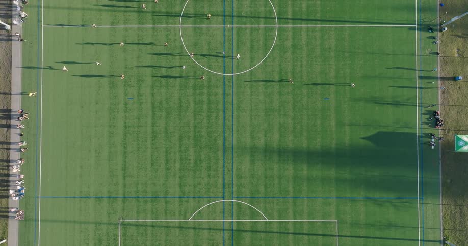 Top down traverse over players competing in a rec league soccer match