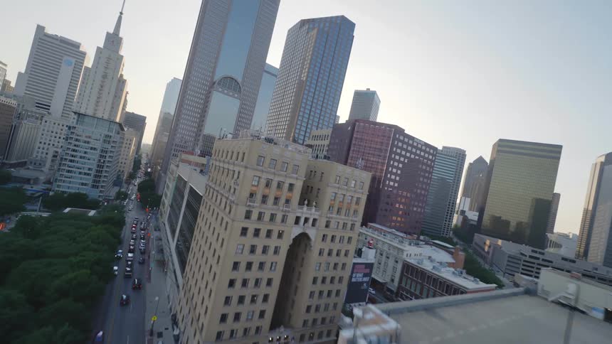 Vehicles driving through downtown Dallas, Texas