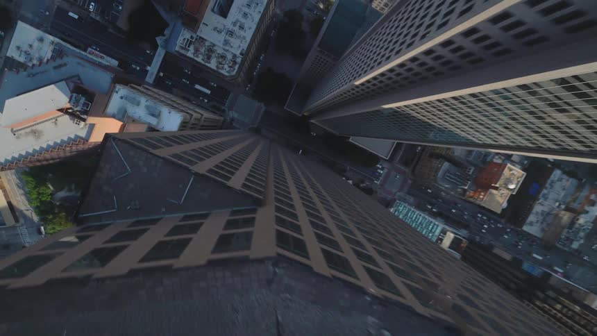 Dallas skyscrapers towering over smaller buildings and city streets