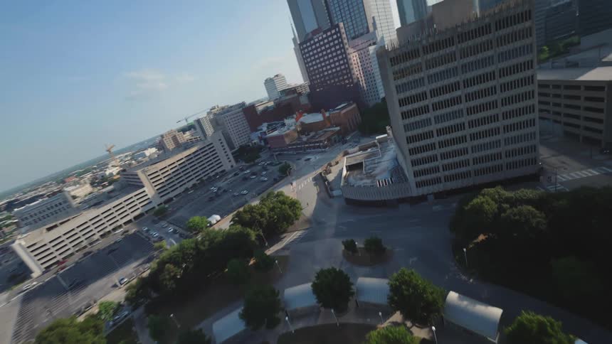 Aerial view of skyscrapers with sunlight reflection in Dallas