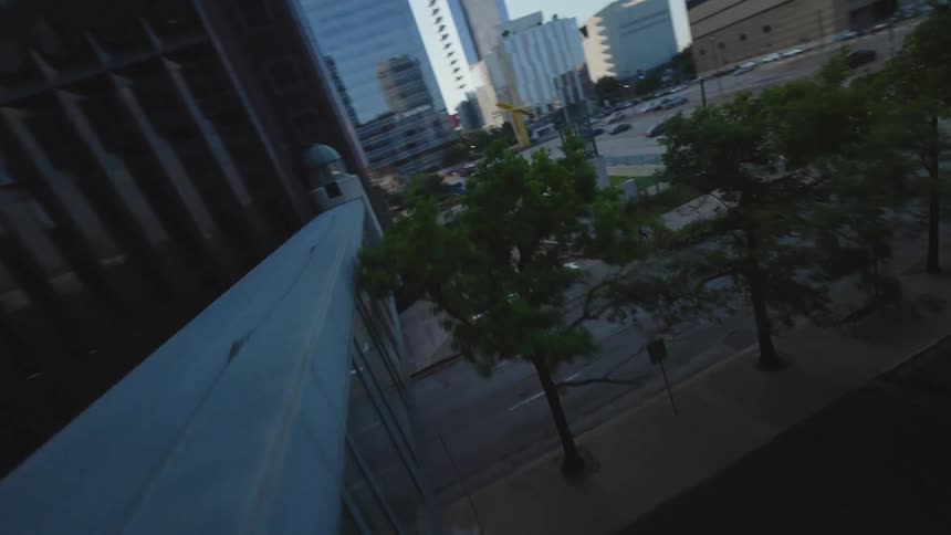 Viaduct, church, and large buildings in downtown Dallas