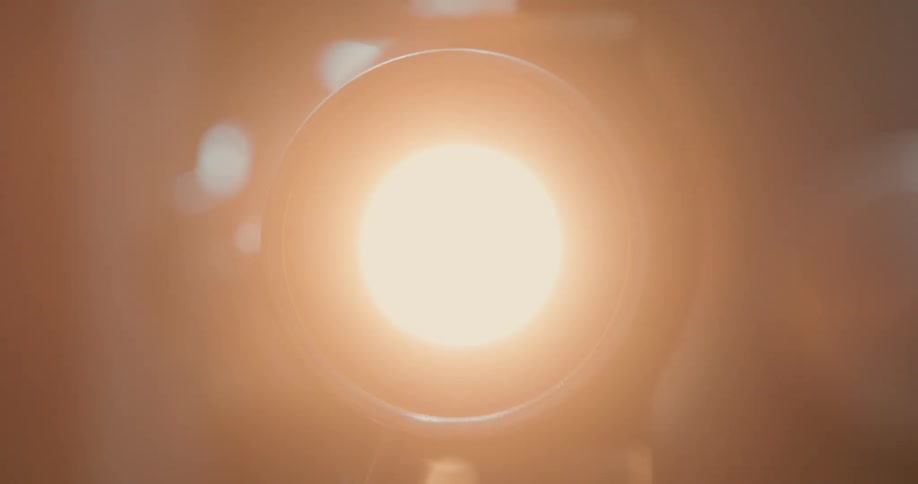 A stationary camera is flashing bright lights