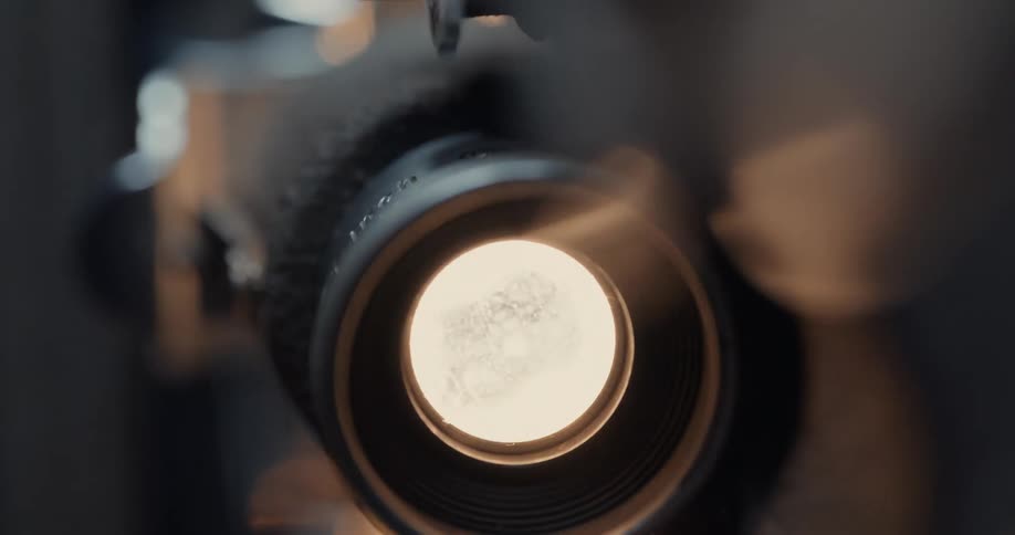 Video camera spinning film casting light all around