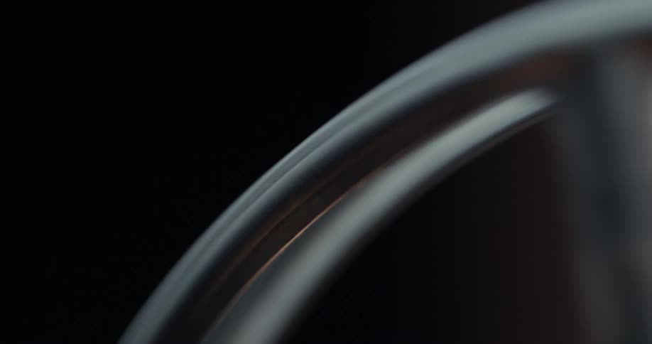 Silver wheel rotates reflecting light off of its underside