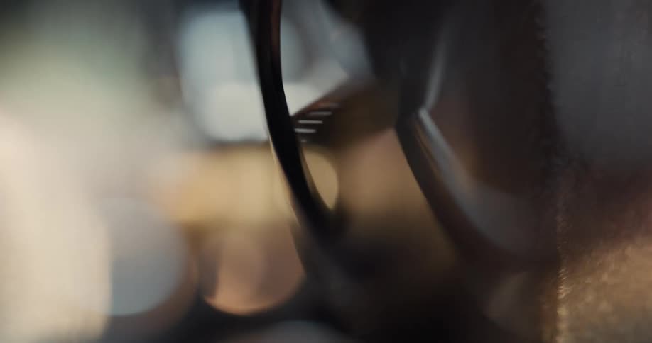 Close up of a roll of film spinning on a vintage projector