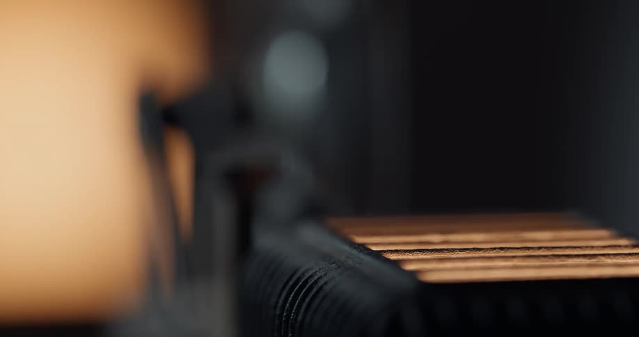 Close up of the light coming out of the back of a vintage film projector