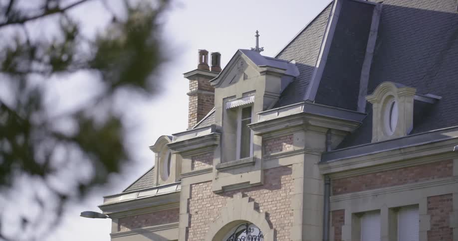 View of the upper left half of a brick building