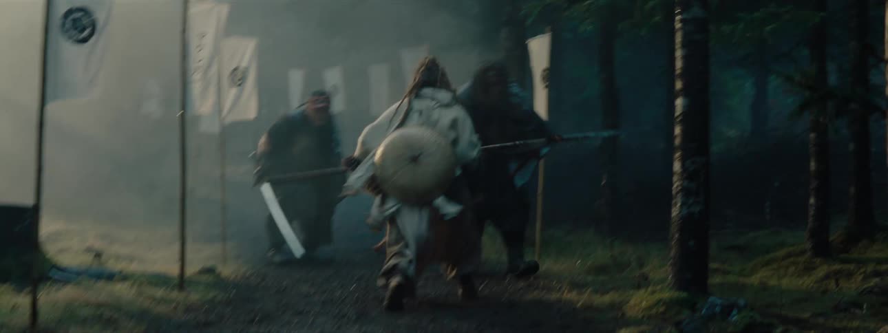 Three warriors on a forest battlefield fighting