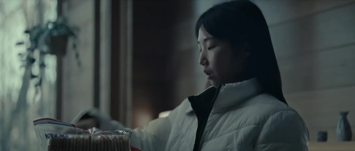 A woman unpacks her groceries