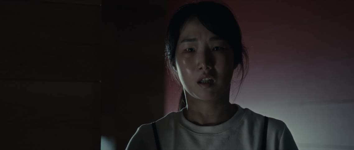 Portrait of a young asian woman with facial expression of crying and fear