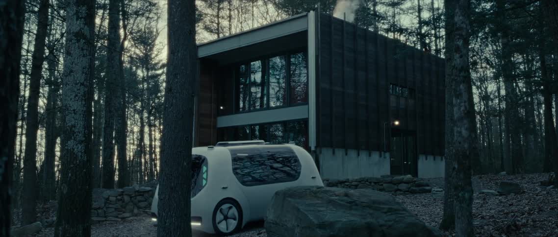 A korean house in the middle of a forest and there is a futuristic self driving car that stops in front and a person gets out to enter the house