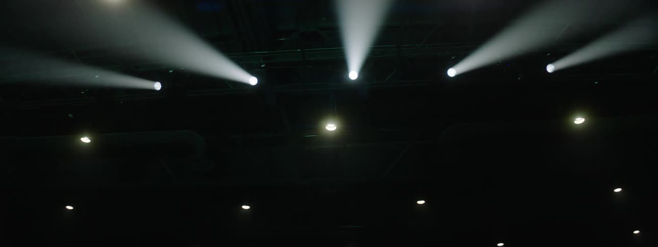 Bright lights on a stage that are moving