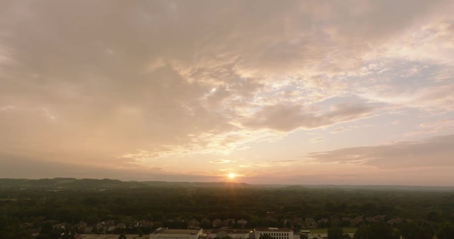 A suburban city landscape at sunset