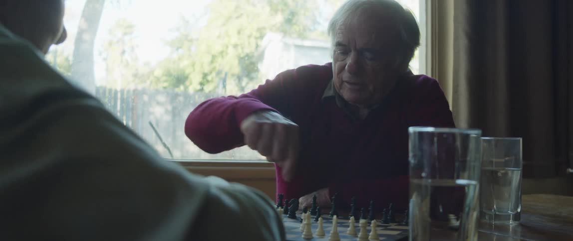 Two men are playing a game of chess