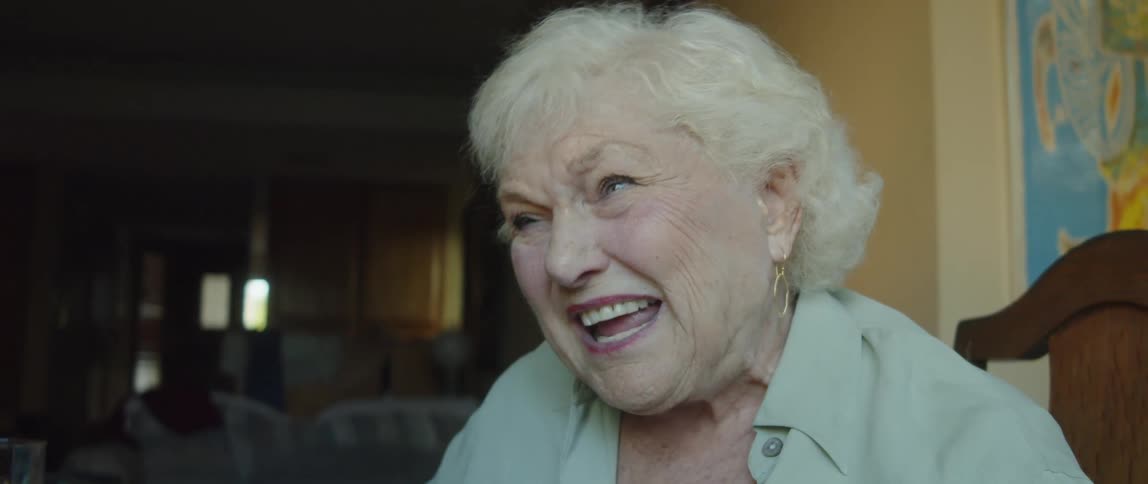 Elderly lady sitting talking