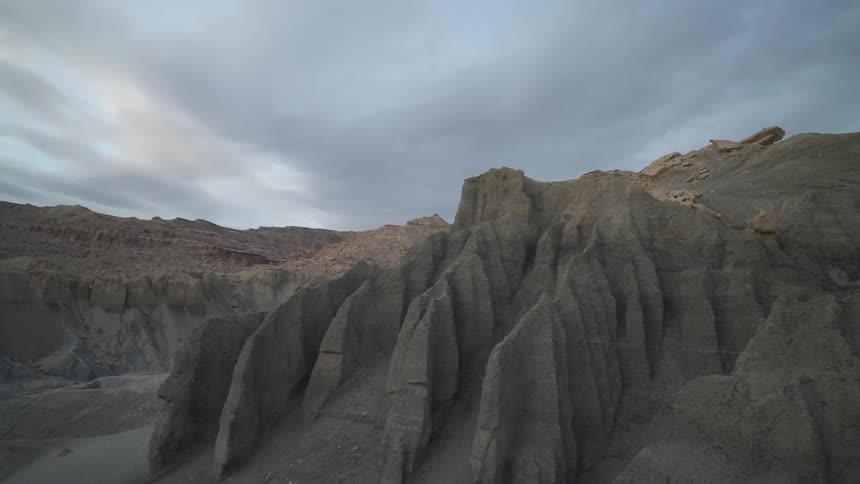 Aerial panorama of rocks and mountains against a cloudy sky